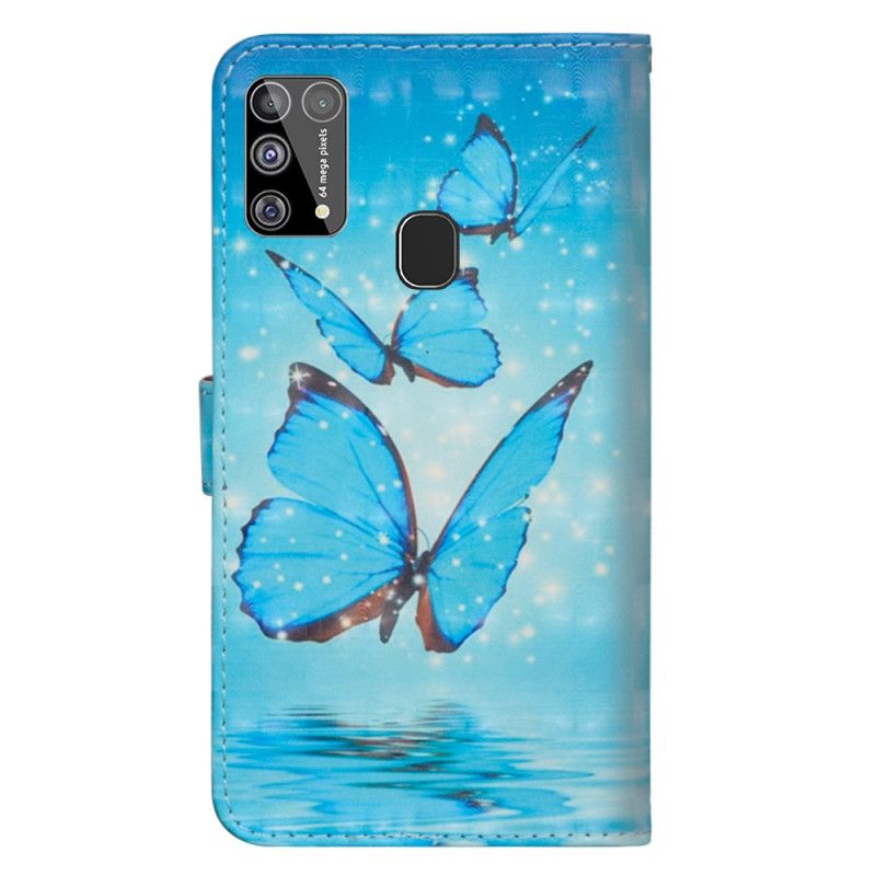 Lederhüllen Samsung Galaxy M31 Fliegende Blaue Schmetterlinge