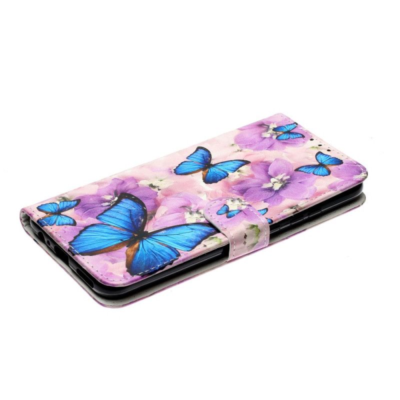Lederhüllen Huawei P Smart 2020 Blaue Schmetterlinge In Den Blüten
