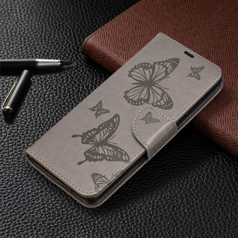 Lederhüllen Samsung Galaxy Note 20 Grau Schmetterlinge Und Schräge Klappe