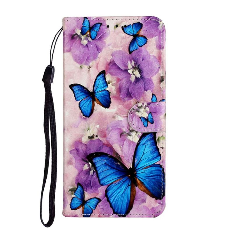 Lederhüllen Huawei Y5p Handyhülle Blaue Schmetterlinge In Den Blüten