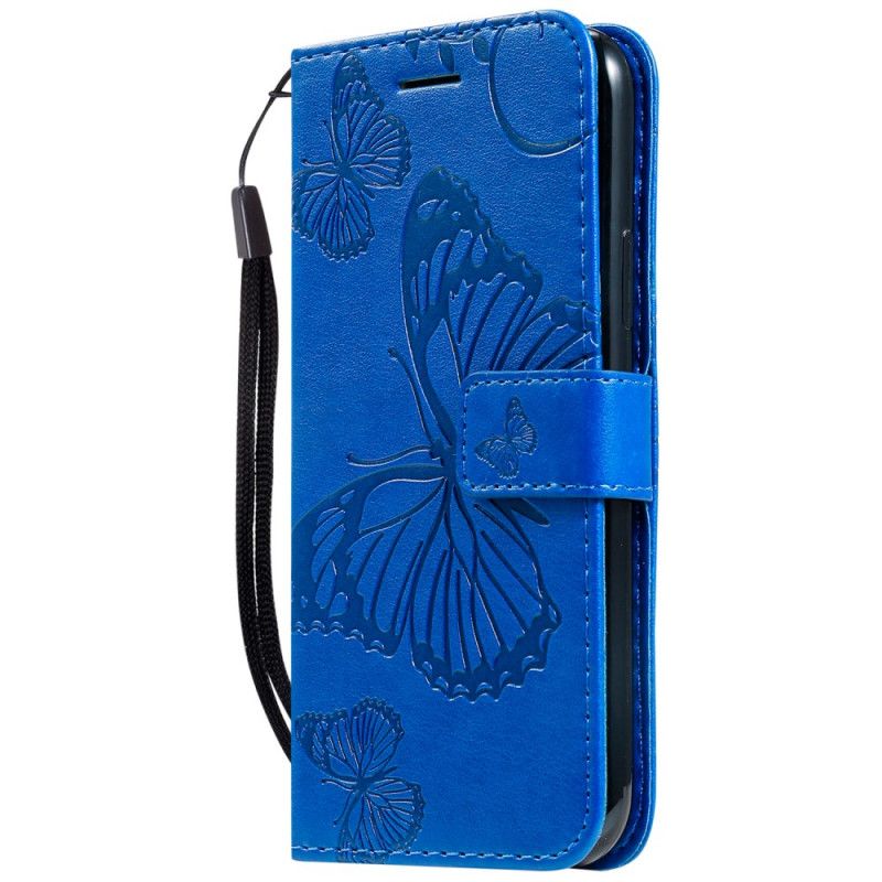 Lederhüllen iPhone 11 Pro Dunkelblau Riesige Tanga-Schmetterlinge