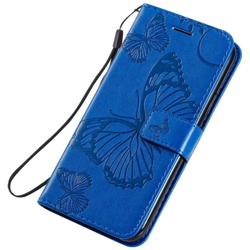 Lederhüllen iPhone 11 Pro Dunkelblau Riesige Tanga-Schmetterlinge
