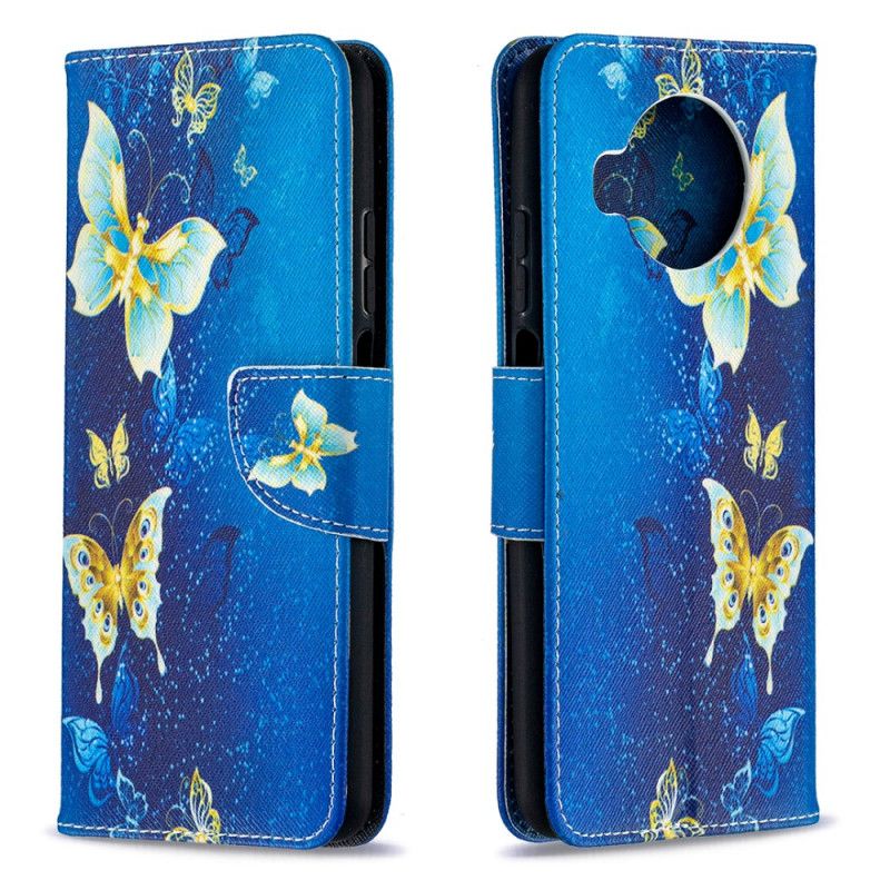 Lederhüllen Xiaomi Mi 10T Lite 5G / Redmi Note 9 Pro 5G Dunkelblau Goldene Schmetterlinge
