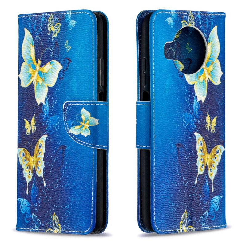 Lederhüllen Xiaomi Mi 10T Lite 5G / Redmi Note 9 Pro 5G Dunkelblau Goldene Schmetterlinge