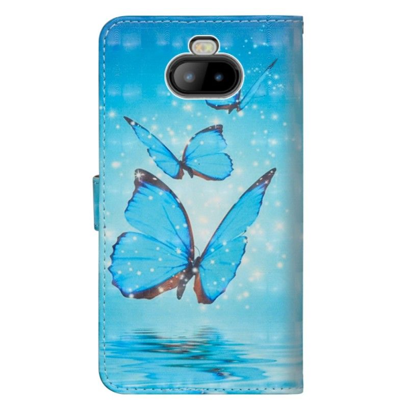 Lederhüllen Sony Xperia 10 Plus Fliegende Blaue Schmetterlinge