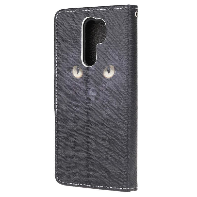 Lederhüllen Xiaomi Redmi 9 Schwarze Katzenaugen Mit Tanga