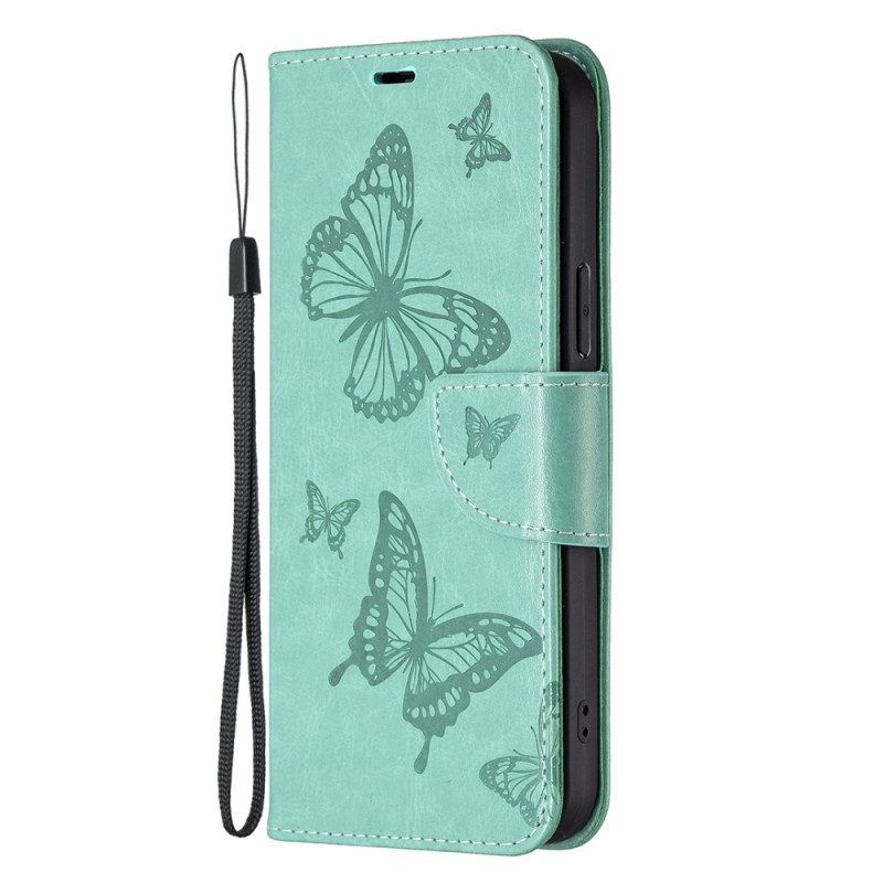 Flip Case Für Xiaomi 13 Mit Kordel Riemchen Mit Schmetterlingen-print