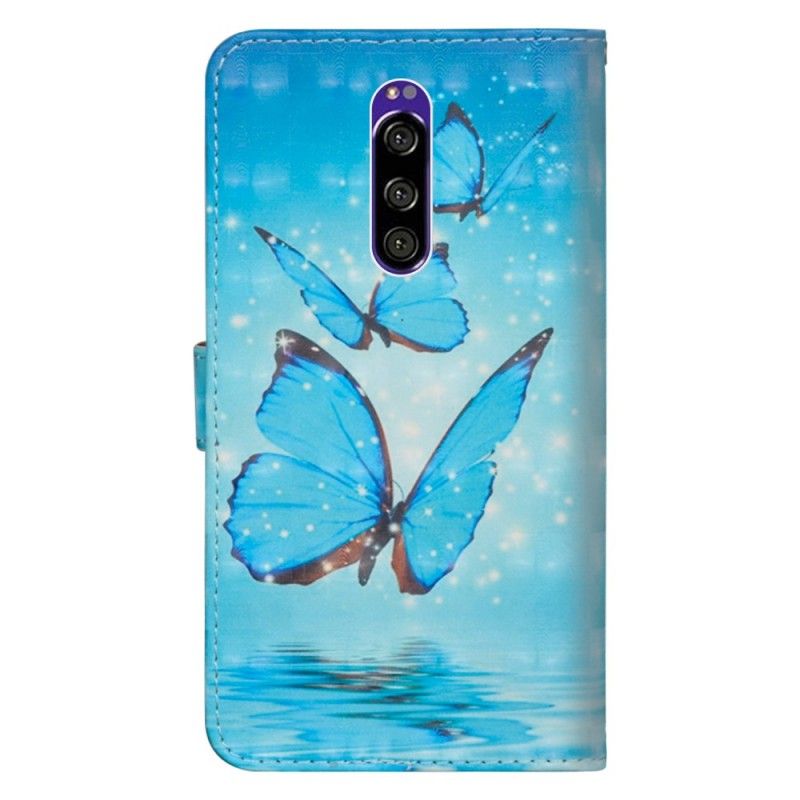 Lederhüllen Sony Xperia 1 Handyhülle Fliegende Blaue Schmetterlinge