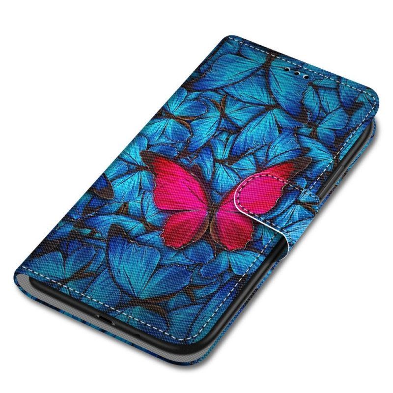 Lederhüllen Für Xiaomi Redmi Note 11 Pro Plus 5G Roter Schmetterling. Blauer Hintergrund