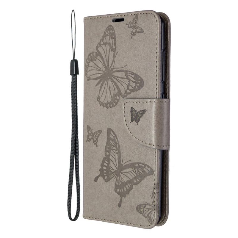 Lederhüllen Samsung Galaxy A41 Grau Schmetterlinge Im Flug Mit Tanga
