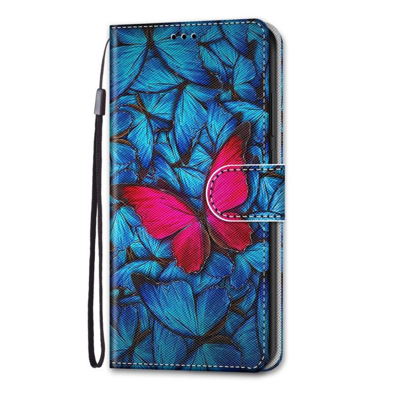 Lederhüllen Samsung Galaxy S21 5G Roter Schmetterling Auf Blauem Hintergrund