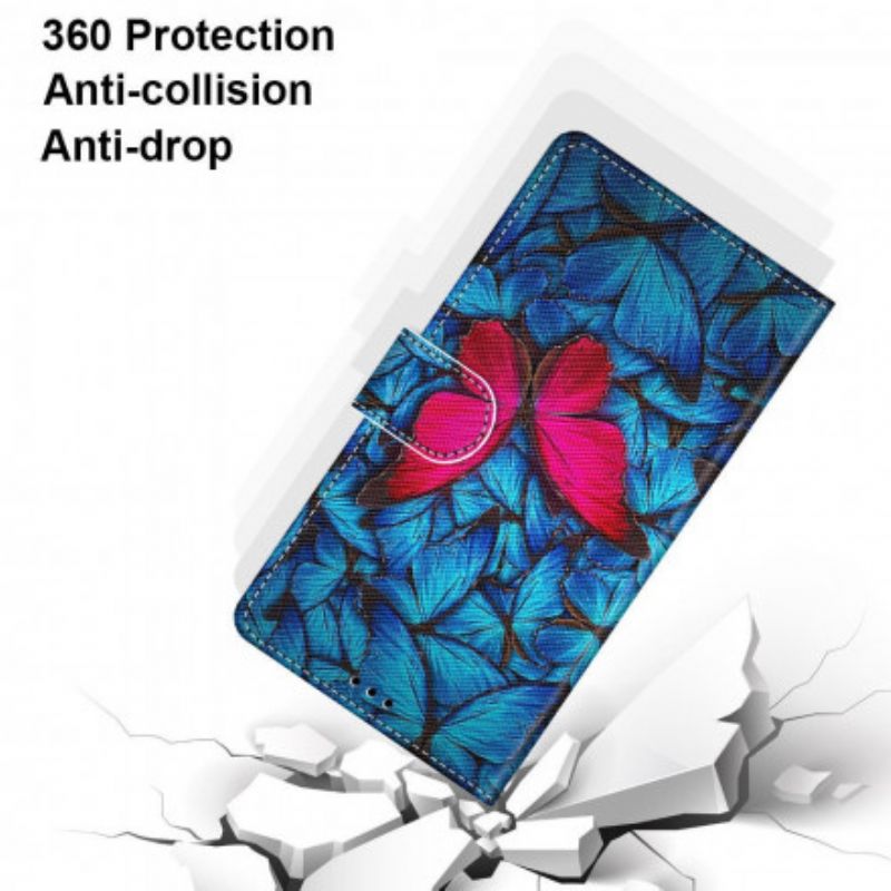 Lederhüllen Xiaomi Redmi 10 Handyhülle Roter Schmetterling Auf Blauem Hintergrund