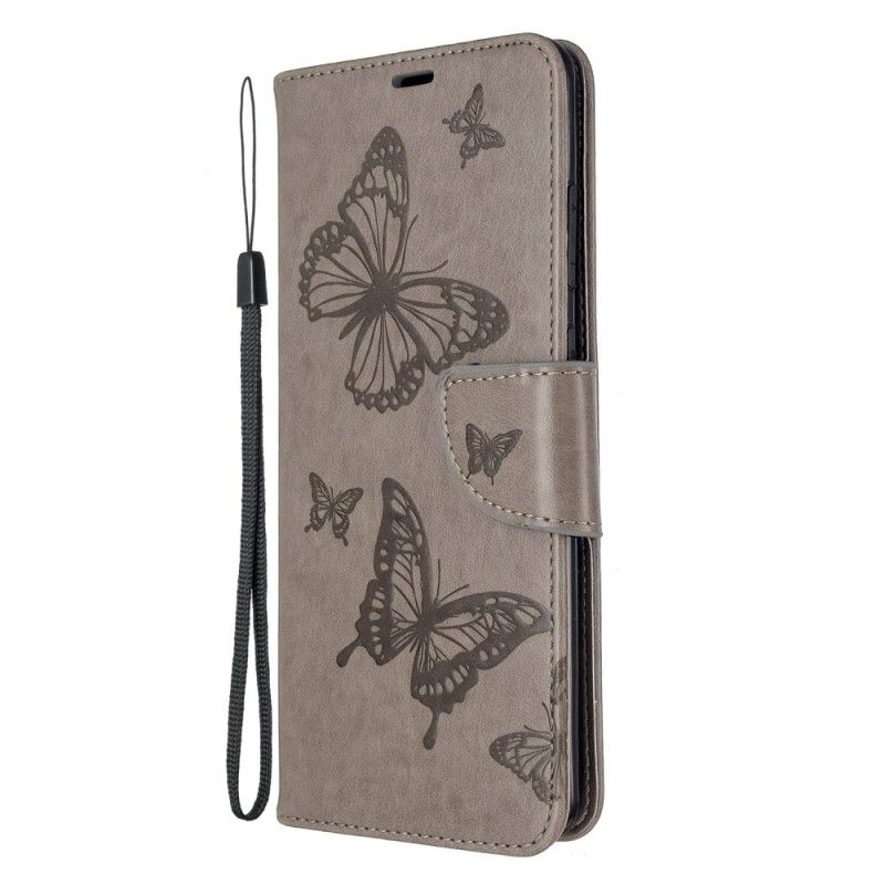 Lederhüllen Samsung Galaxy S20 Ultra Hellpurpur Handyhülle Schmetterlinge Im Flug Mit Tanga