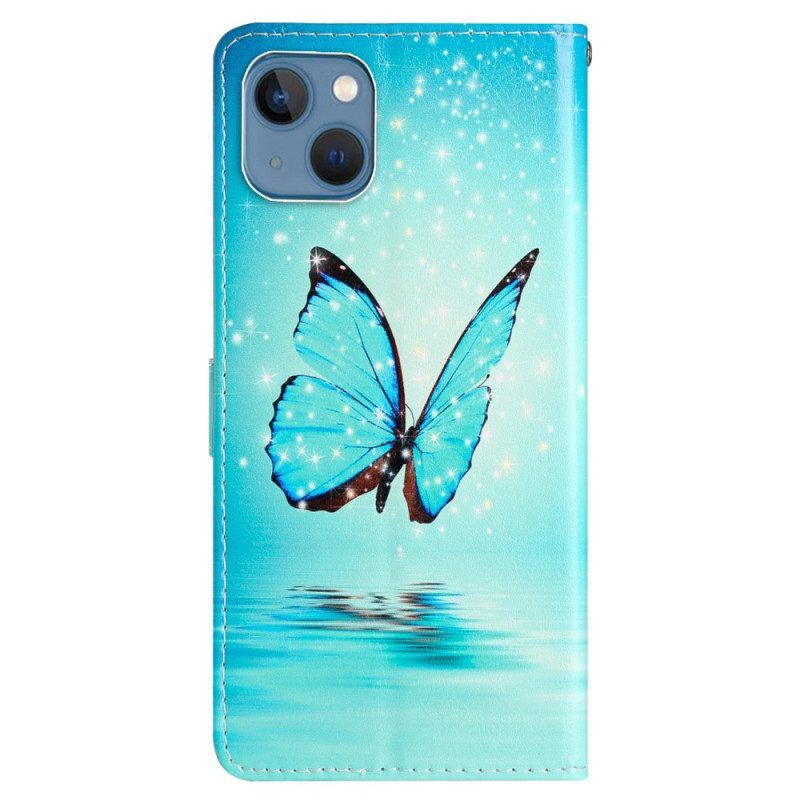 Lederhüllen Für iPhone 15 Mit Kordel Blauer Schmetterling Im Flug Mit Riemen