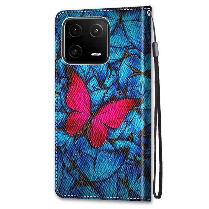 Flip Case Für Xiaomi 13 Pro Roter Schmetterling. Blauer Hintergrund