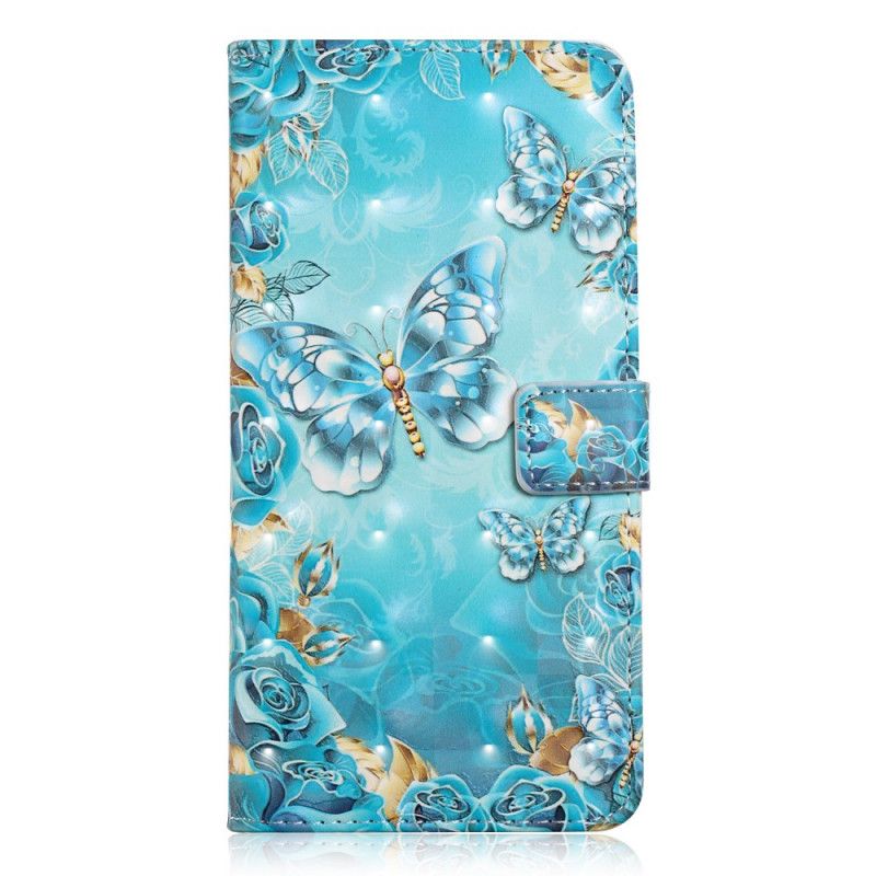 Lederhüllen Xiaomi Redmi 7A Schmetterlinge Und Blumen Auf Blauem Grund