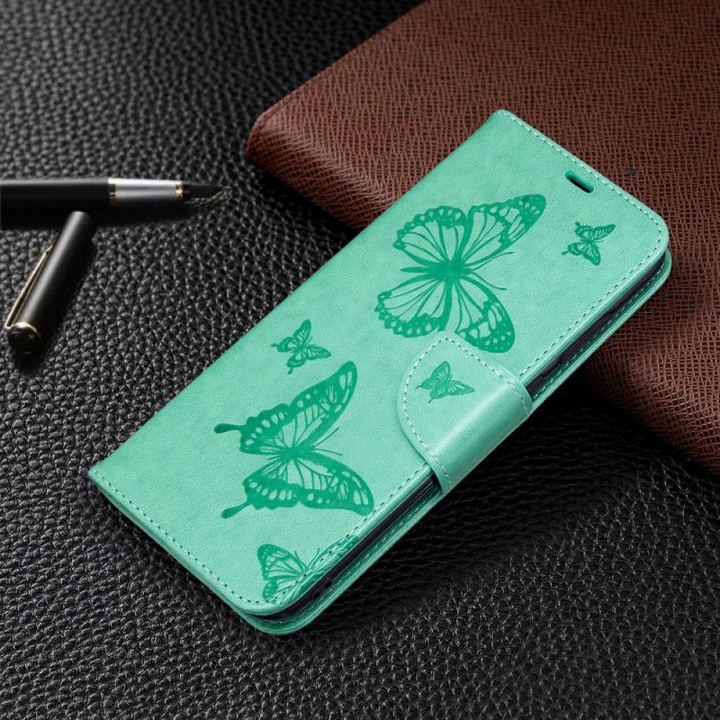 Lederhüllen Für Samsung Galaxy M11 Grau Schmetterlinge Im Flug Mit Tanga