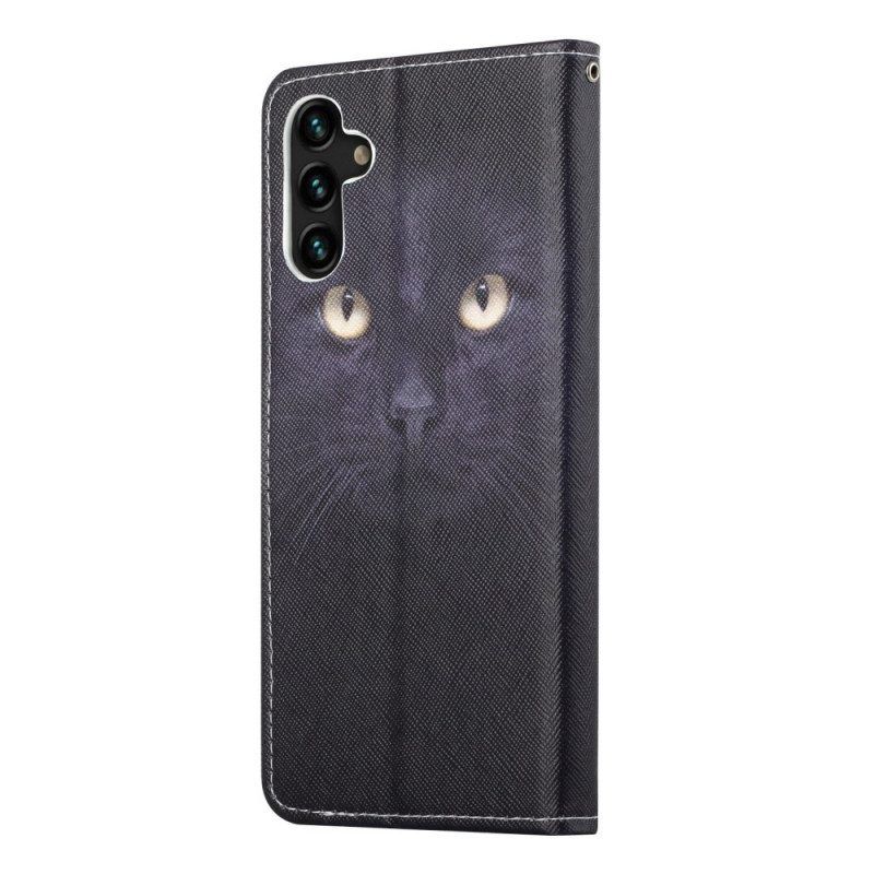 Lederhüllen Für Samsung Galaxy A13 5G / A04s Mit Kordel Riemchenförmige Schwarze Katzenaugen