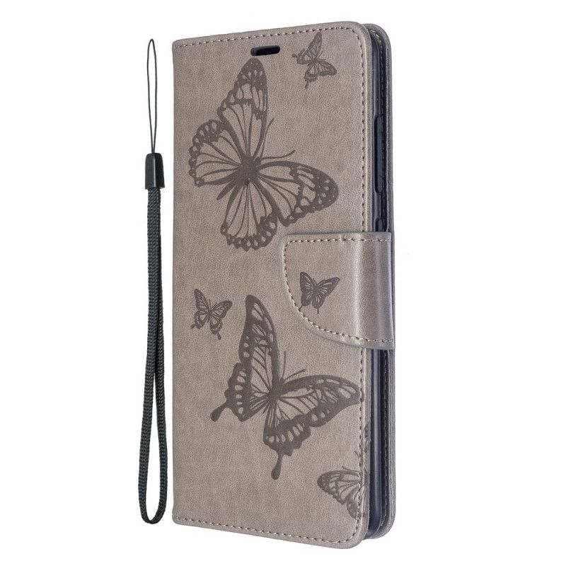 Lederhüllen Samsung Galaxy A51 Grau Schmetterlinge Im Flug Mit Tanga